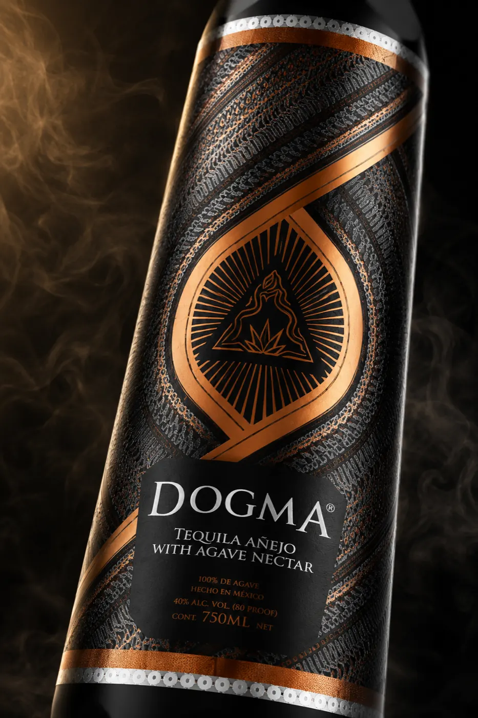 Macro detail of the DOGMA Signature label — copper isotype and engraved pattern